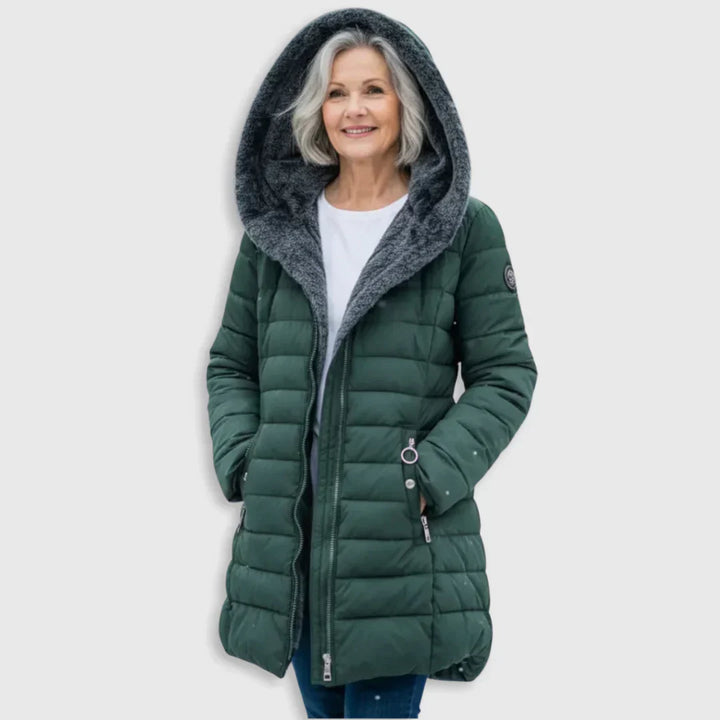 Dark green padded winter jacket with gray hood lining, front zipper, side pockets.