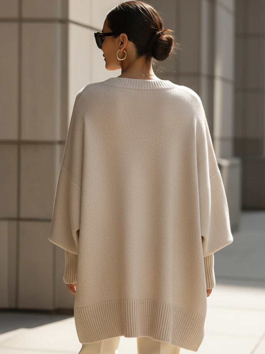 Beige wool-blend oversized jumper, back view with ribbed hem and cuffs