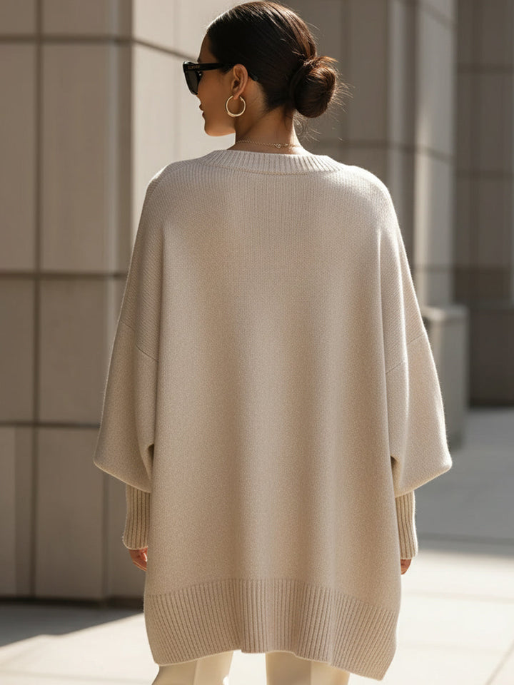 Beige wool-blend oversized jumper, back view with ribbed hem and cuffs