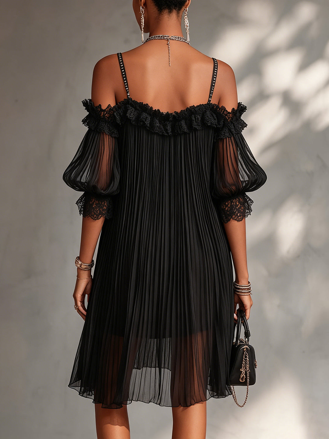 Vittoria | Black mini dress in muslin with off-shoulder design and lace edges