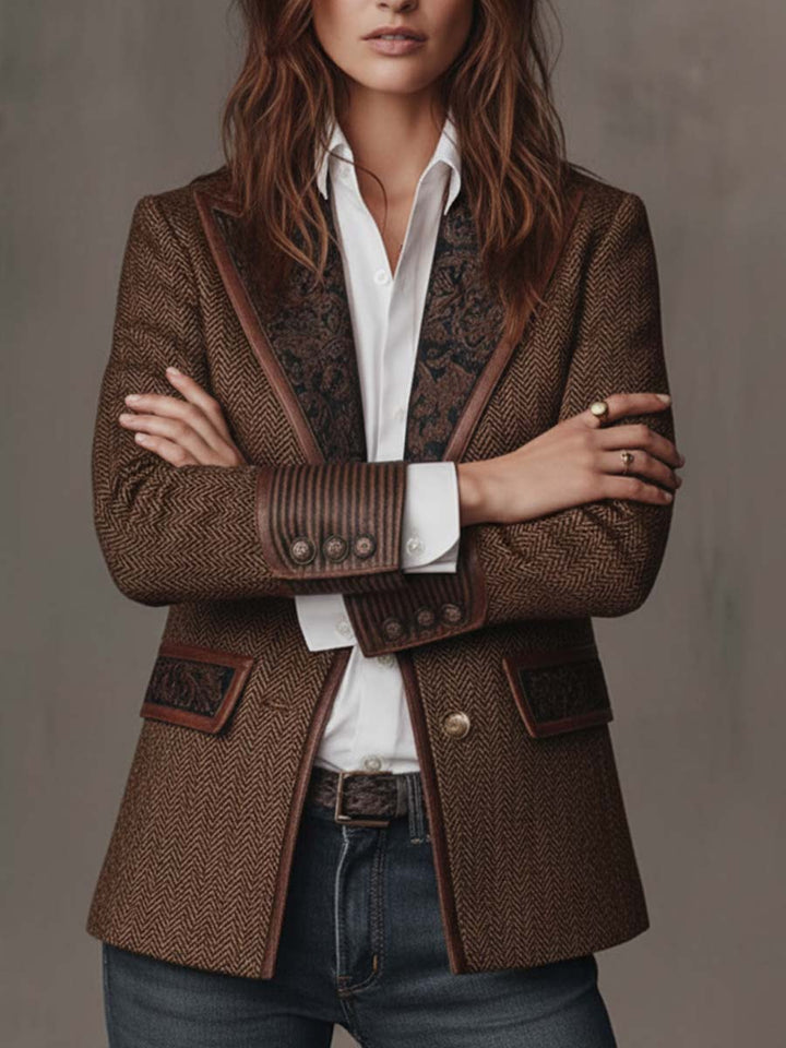 Brown tweed blazer with dark printed inserts, double-button cuffs, and chest pockets