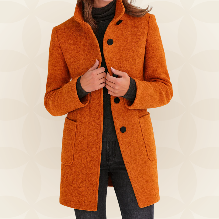 Women’s orange wool coat with high collar, button front, and side pockets