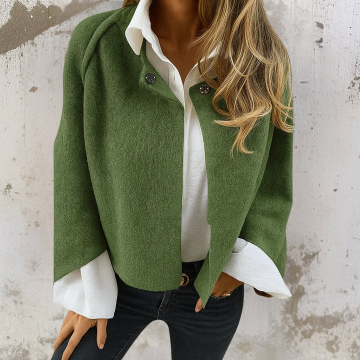 Green short jacket with button front and wide collar