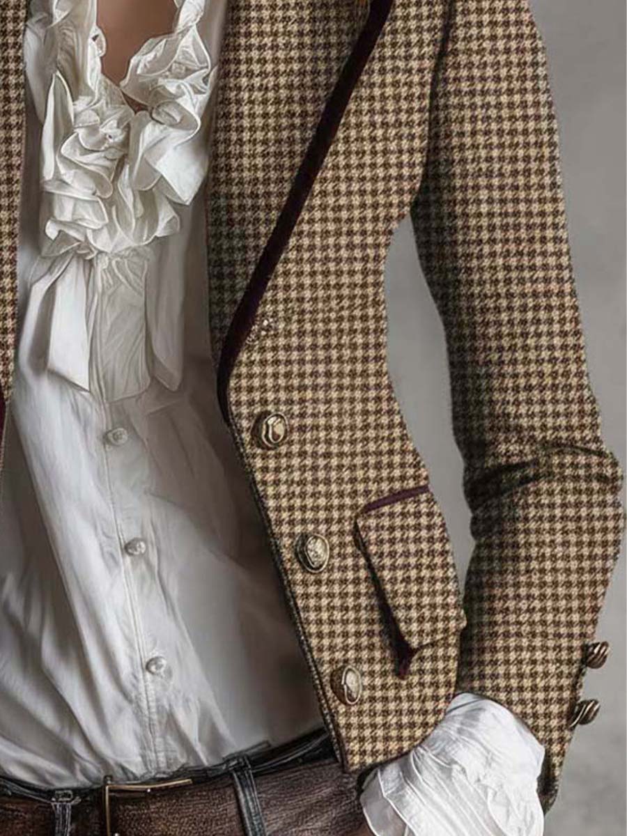 Brown houndstooth tweed blazer with flap pocket, dark piping, and cuff buttons