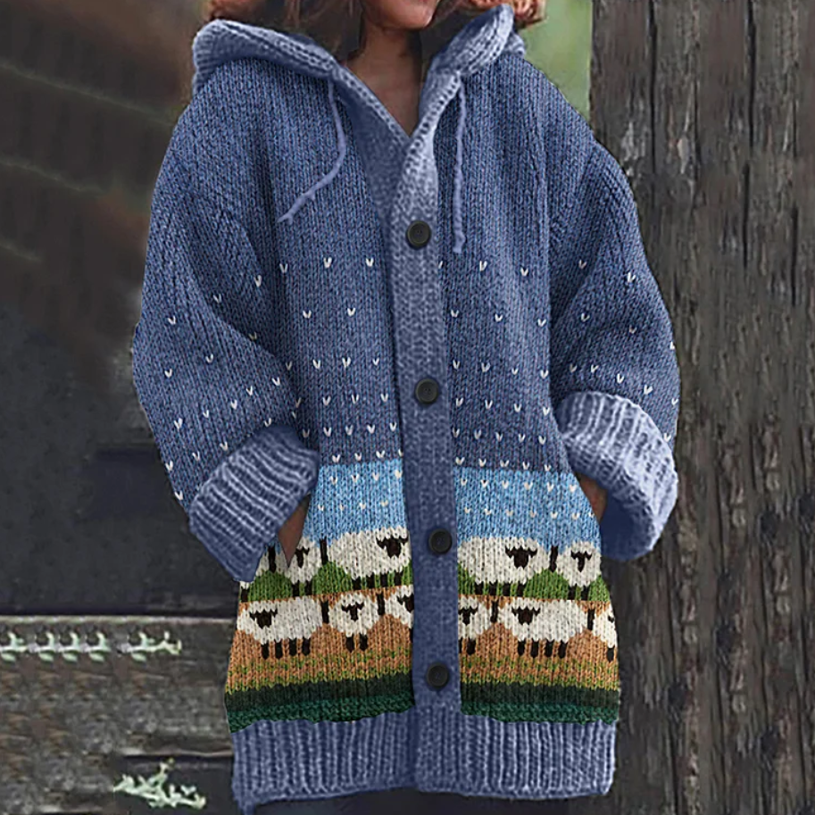 IRIS lightweight drape vest, light blue hooded knit with dotted pattern and multicolor hem motifs