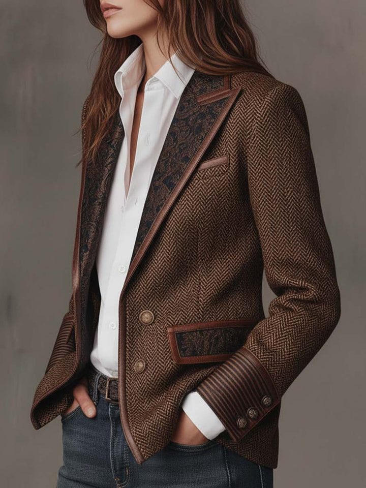 Brown tweed blazer with dark printed lapels, button front, and welt pocket detail