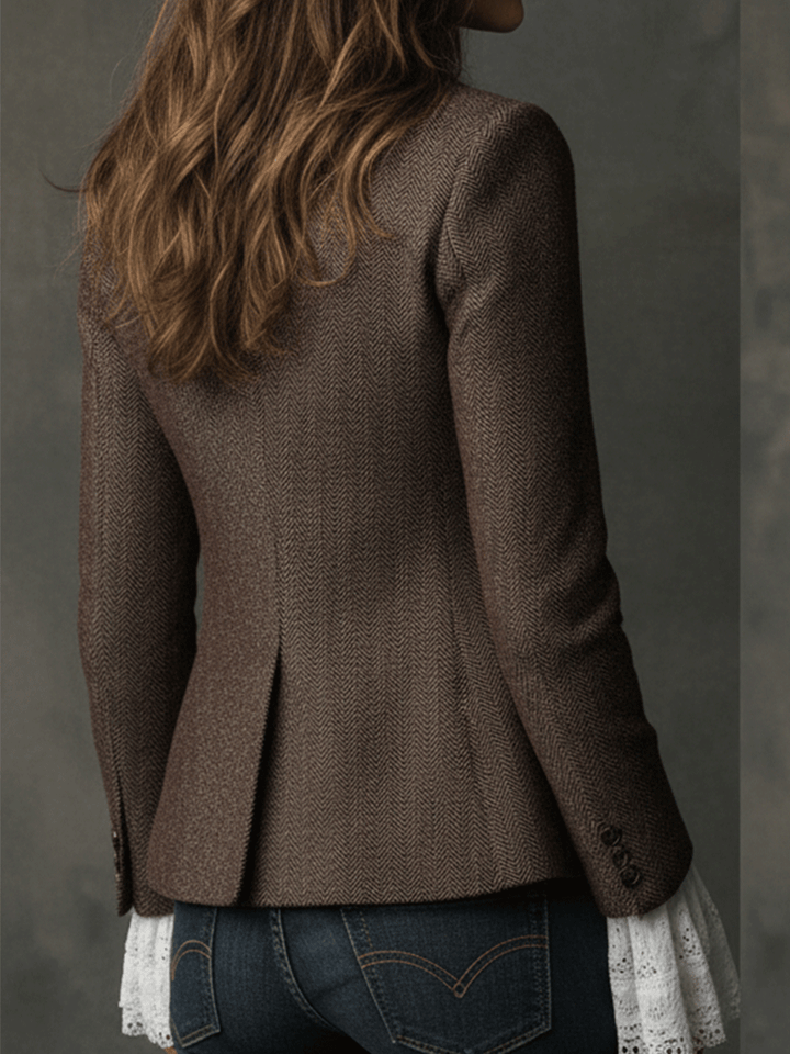 Women's brown tweed blazer, back view with tailored seams and long sleeves.