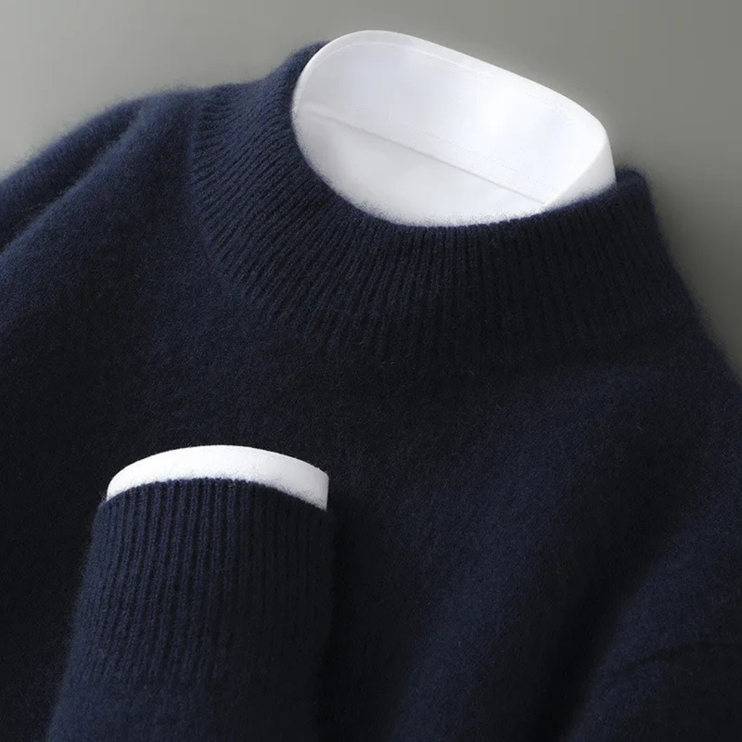 Navy cashmere turtleneck sweater close-up of ribbed collar and cuff detail