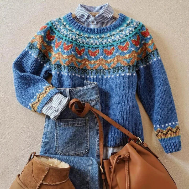 Blue fair isle knit jumper with striped yoke, ribbed hem and round neckline