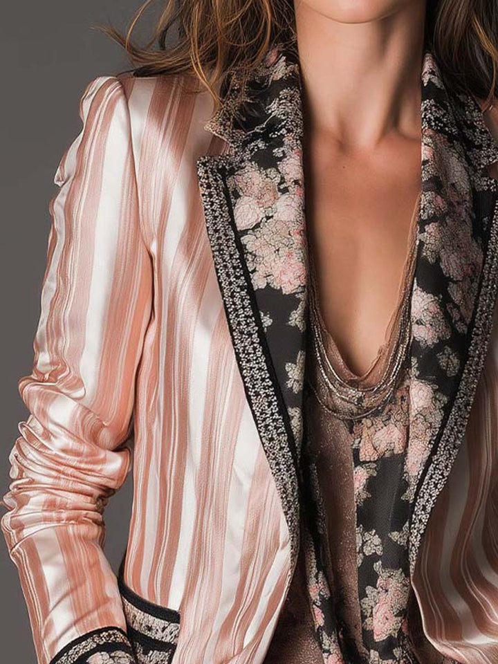 Pink satin-striped blazer front with black-trim shawl lapels and floral-pattern lining