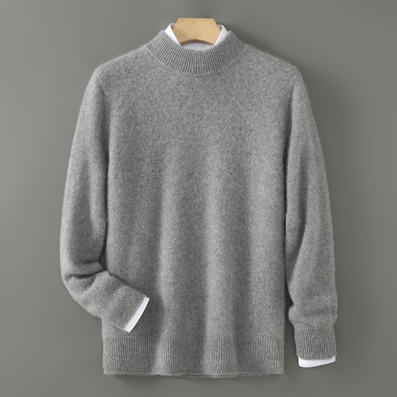 Heather grey cashmere crewneck sweater with ribbed hem, cuffs, and neckline