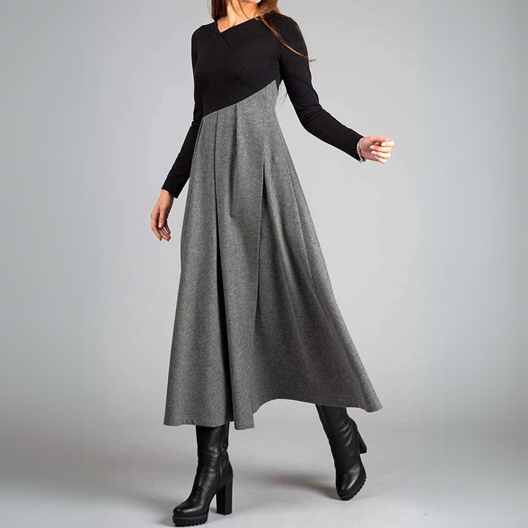 Ruched bodycon midi dress, black fitted top with gray flared skirt and long sleeves