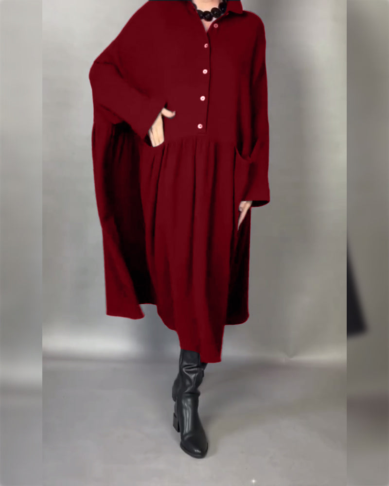 Red long-sleeve A-line button collar dress with flared hem and gathered waist.
