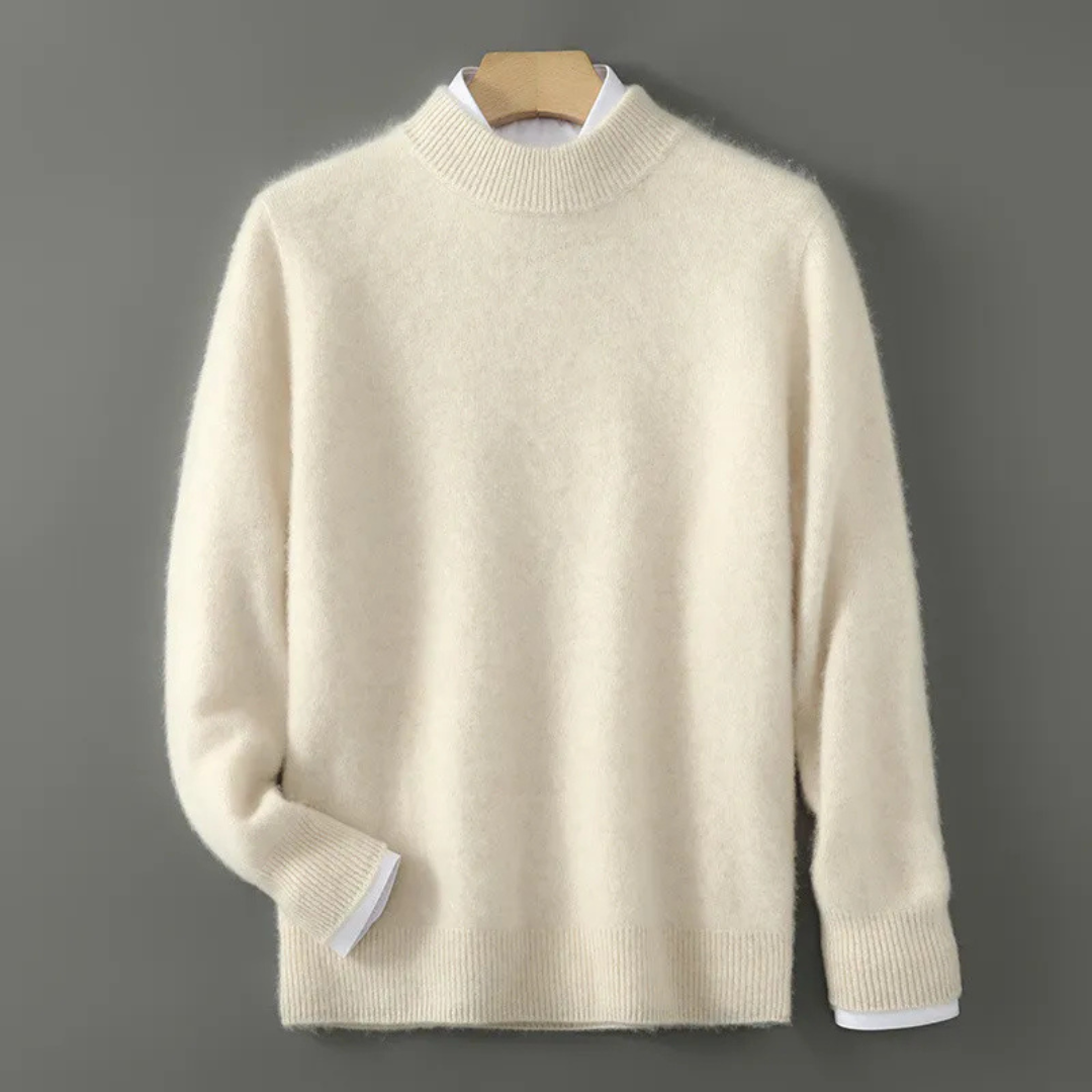 Cream cashmere crewneck sweater with ribbed hem, cuffs, and neckline