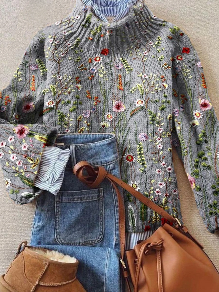 Grey floral knit jumper with multicolor embroidered flowers, ribbed high neckline