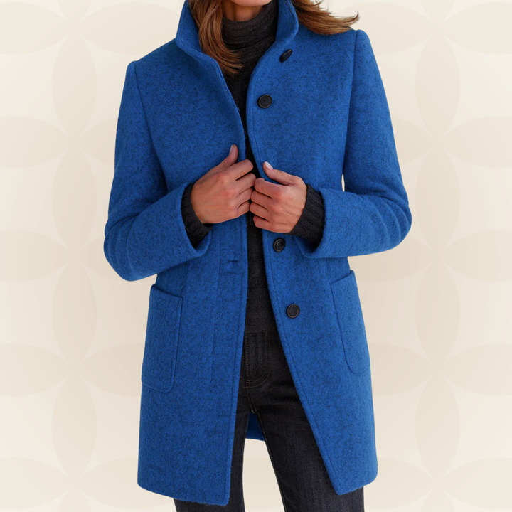 Women’s blue wool coat with high collar, button front, and side pockets