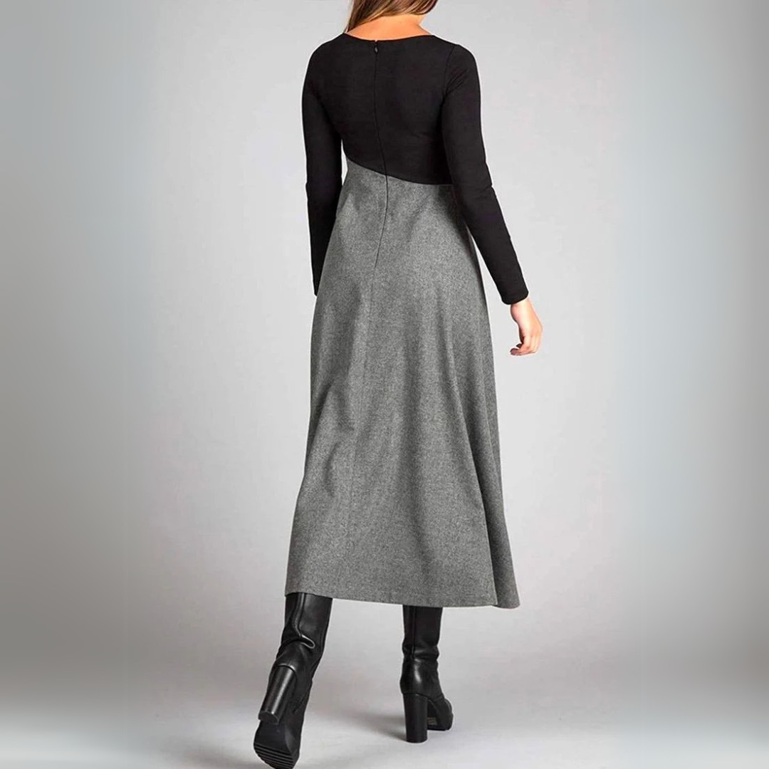 Back view of ruched bodycon midi dress with black sleeves and gray gathered skirt
