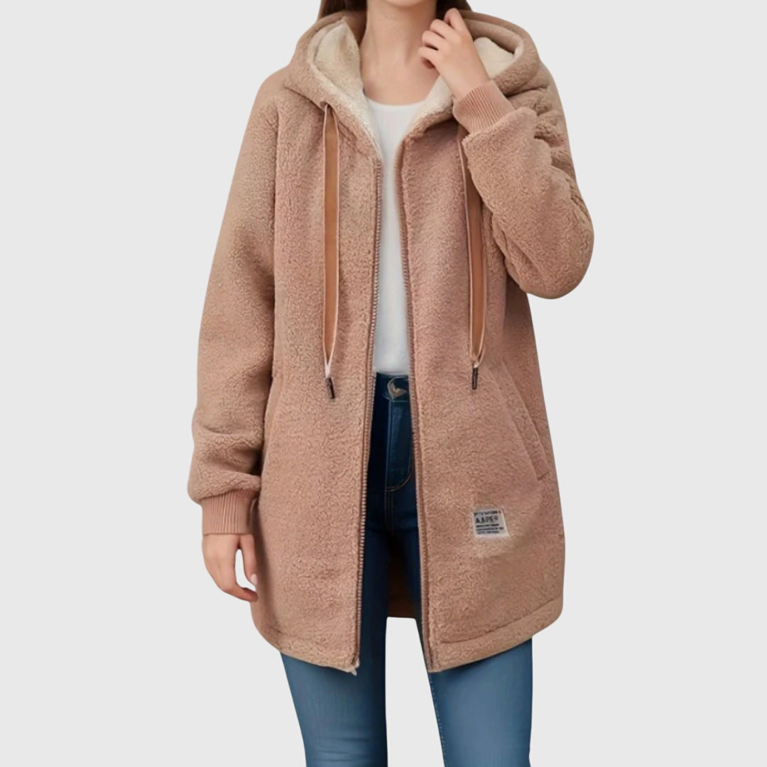 Chestnut sherpa zip-up hooded coat on model, cream hood lining, zipper, drawstring ties.