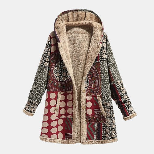 Geometric patchwork coat with beige sherpa lining and burgundy/black patterned exterior