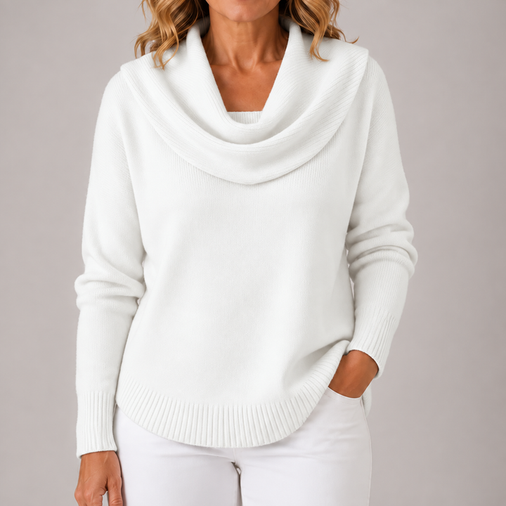 White cowl neck knit sweater with draped cowl, long sleeves, ribbed cuffs and hem