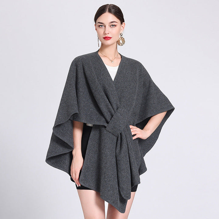 Dark gray fleece caped shawl with V-neck and tied waist belt, draped sleeves