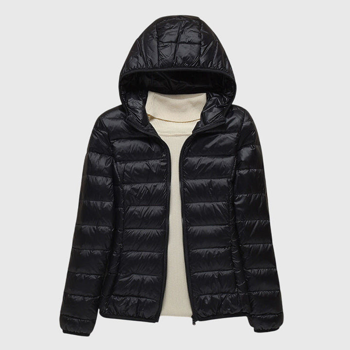 Ultralight hooded puffer jacket in black, full-zip front with quilted panels