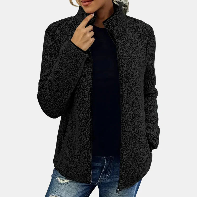 Black teddy jacket with full zipper and stand collar on model