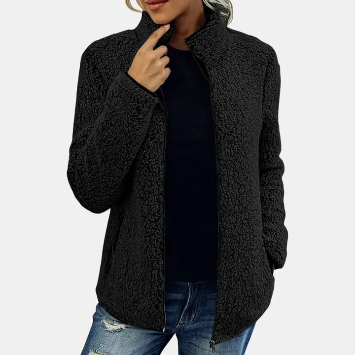 Black teddy jacket with full zipper and stand collar on model
