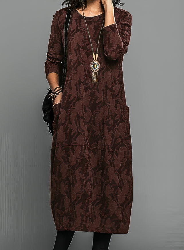 Burgundy knit midi dress with tonal vine pattern and waist belt, long sleeves