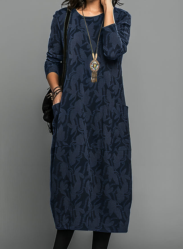 Blue knit midi dress with tonal vine pattern and waist belt, long sleeves
