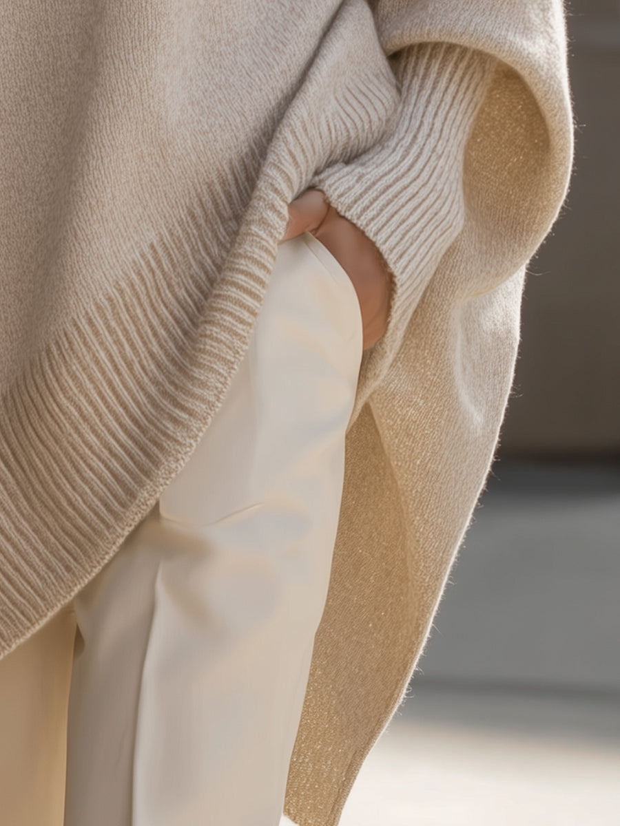 Beige wool-blend jumper sleeve with ribbed cuff and textured knit hem