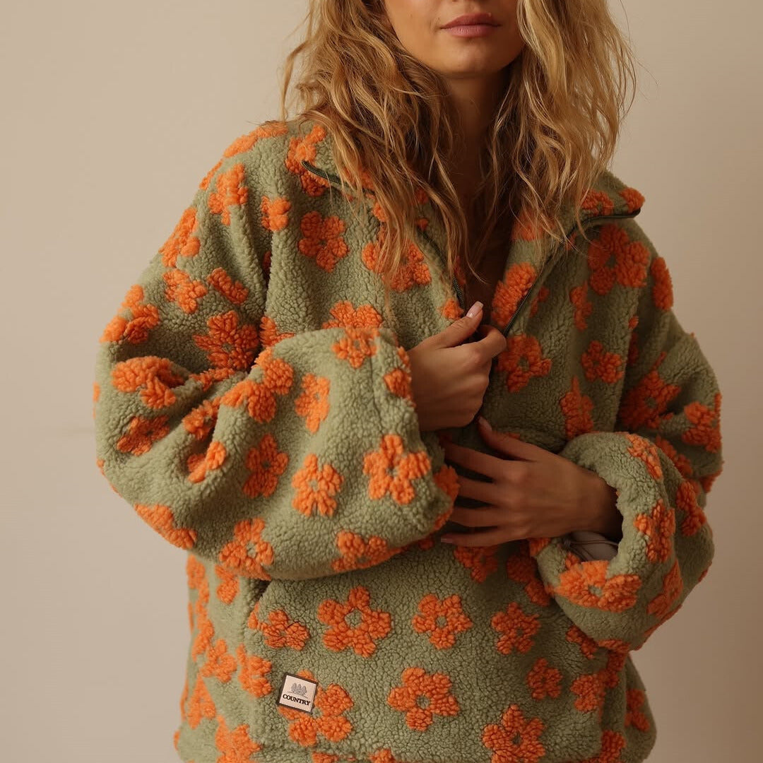 Floral fleece half-zip pullover with hood, sage green with bright orange flower print