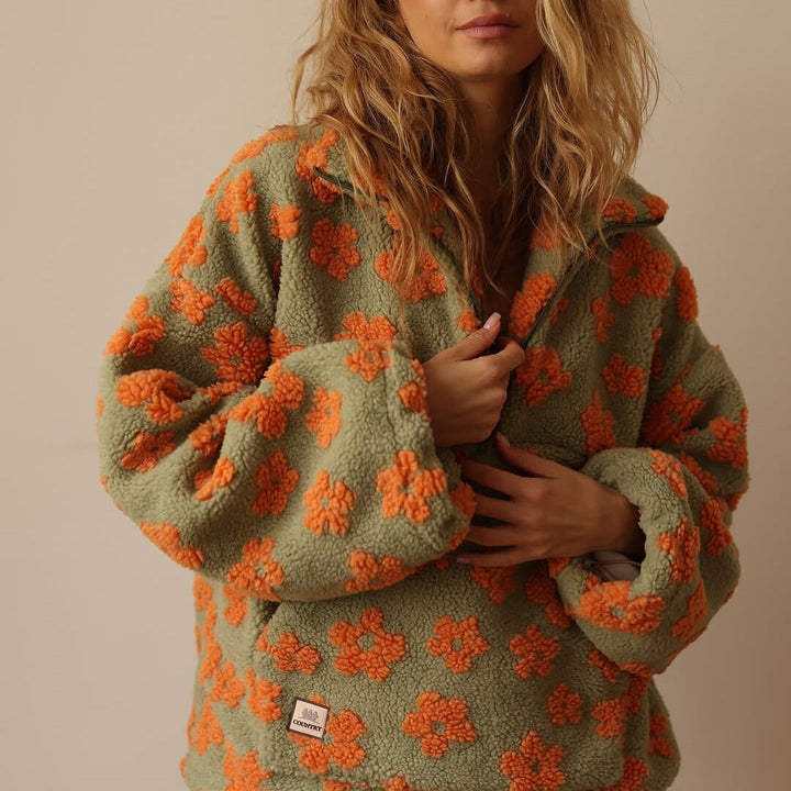 Floral fleece half-zip pullover with hood, sage green with bright orange flower print