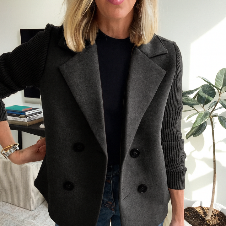 Black ribbed blazer coat with notched lapels and round button front