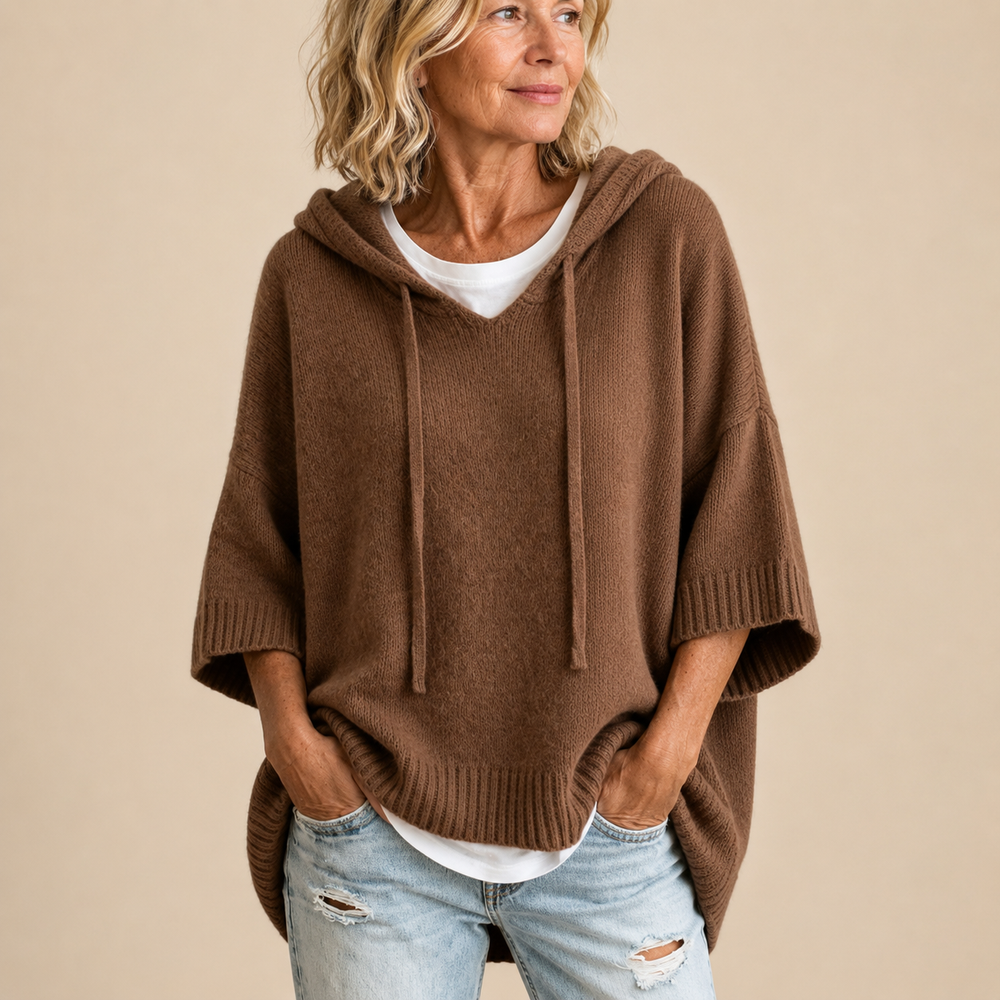 Brown knit hooded poncho sweater, draped loose fit, ribbed hem and sleeve cuffs