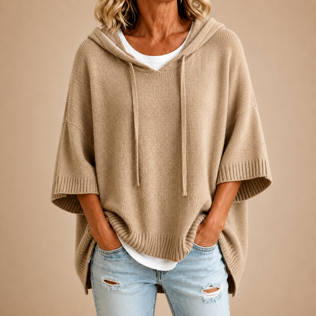 Khaki hooded knit poncho with draped cowl neckline and ribbed cuff hems