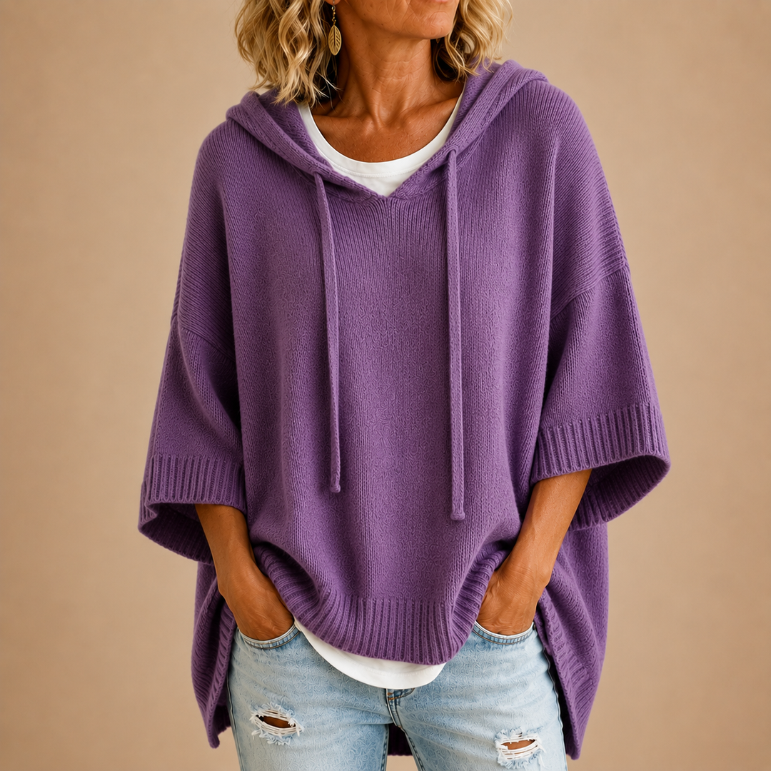 Purple hooded knit poncho with drawstring hood, loose draped fit, side slits