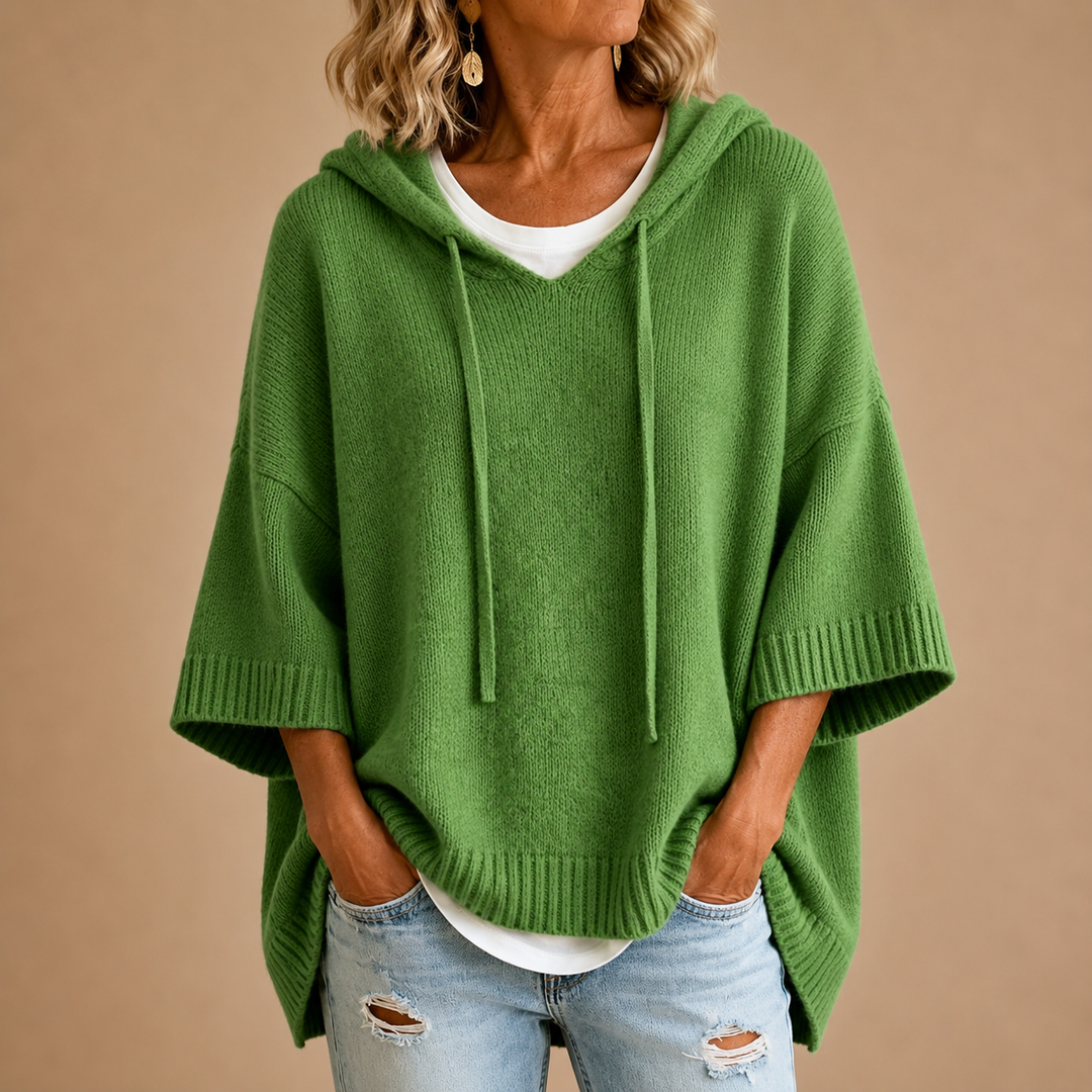 Green knit poncho sweater with hood, drawstring, ribbed hem and cuffs