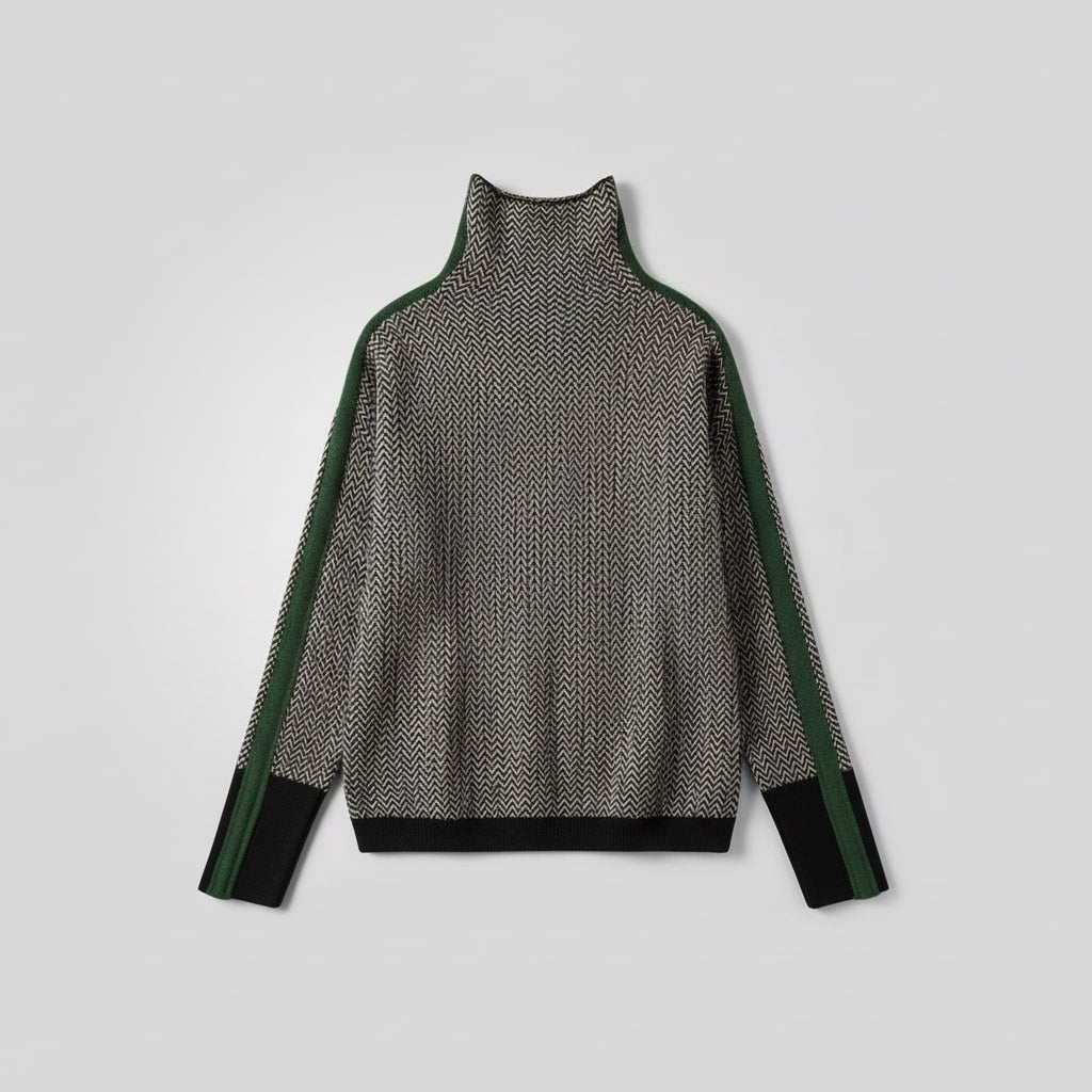 Black-and-white zigzag roll neck jumper with green side stripe panels