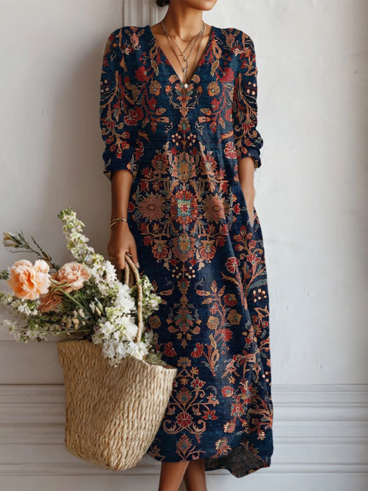 Navy floral relaxed pocket dress with V-neck and long sleeves, elastic cuffs