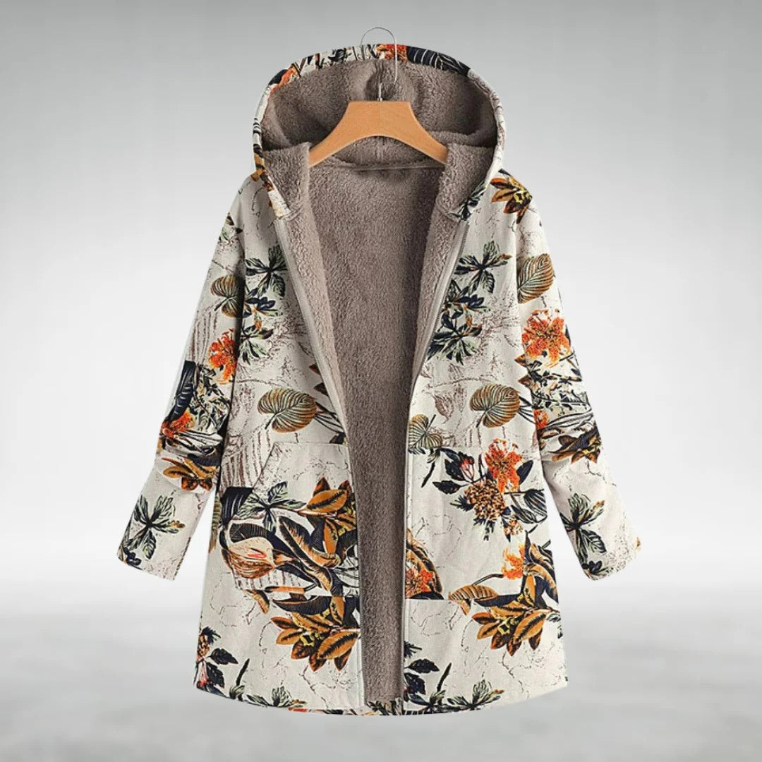 Floral fleece jacket with off-white print, orange and green leaves, gray hood lining, zip front