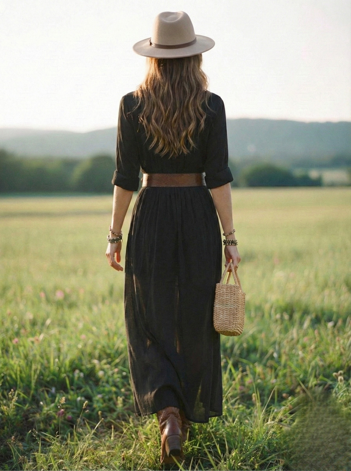 Black layered maxi dress back view with gathered waist, button details, brown belt
