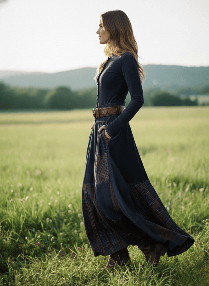 Navy faux suede maxi dress side view with plaid skirt panels and matching waist belt