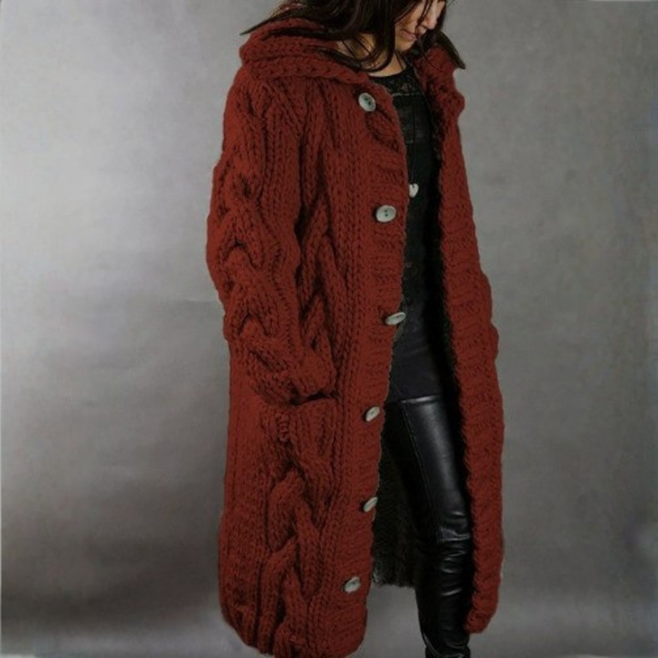 Red long knit hooded vest with cable knit texture and button-front closure