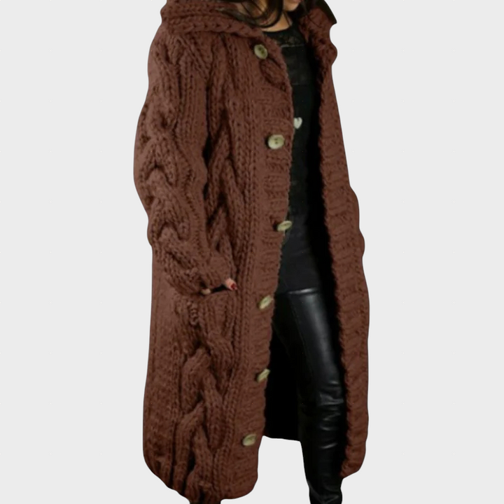 Brown cable-knit hooded cardigan with button front and chunky cable knit texture.