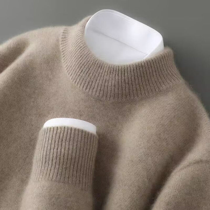 Taupe cashmere turtleneck sweater close-up of ribbed collar and sleeve cuff