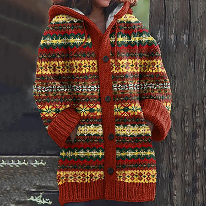 Orange-red knitted button-front cardigan vest with multicolor fair isle stripes
