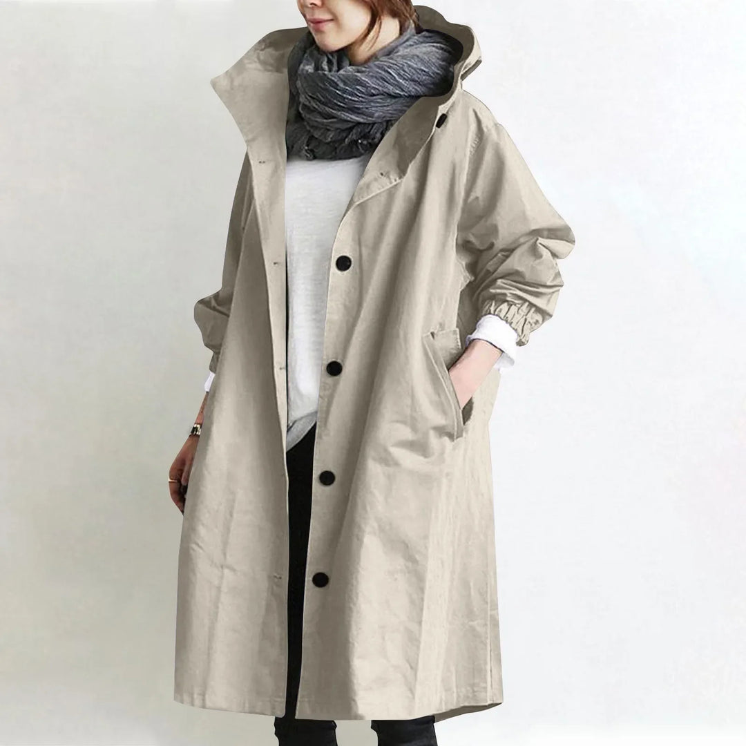 Hooded longline trench coat in beige with double-breasted button front and hood