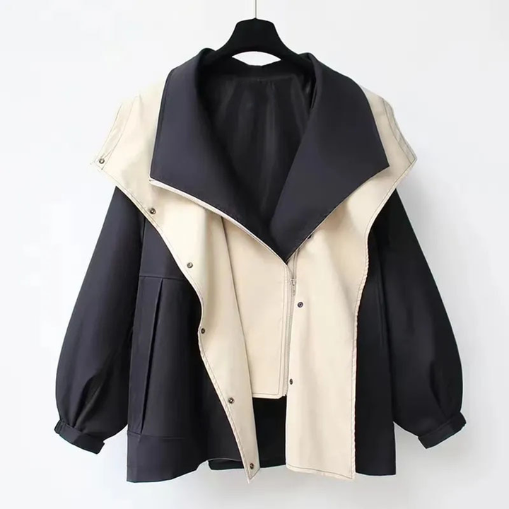 Two-tone hooded windbreaker jacket in dark navy with white front panel.