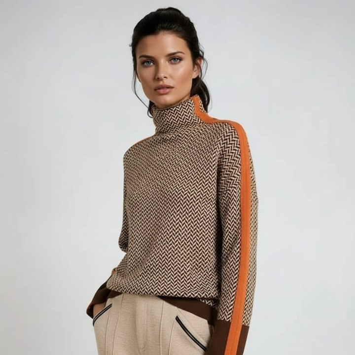 Women’s roll neck chevron knit sweater with orange contrast panels on sleeves
